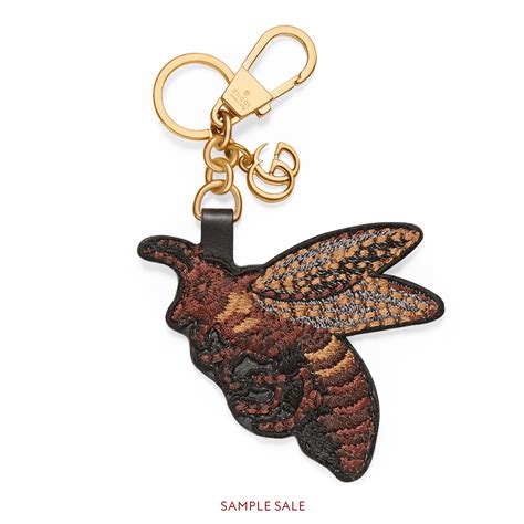 bee keychain gucci|Gucci bee accessories.